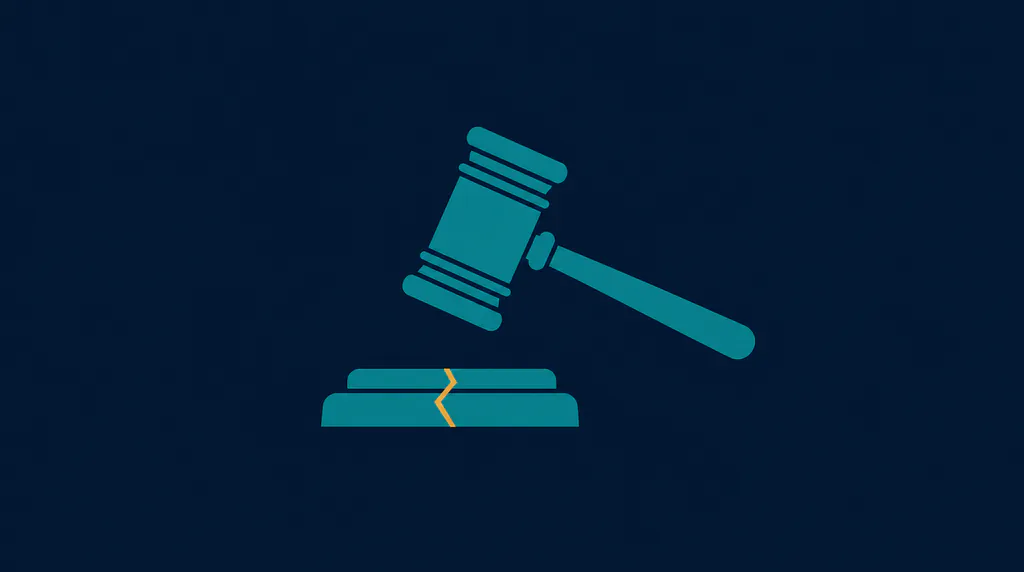 A judge's gavel above a cracked base